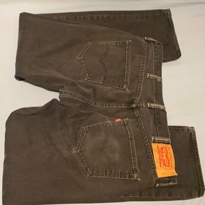 Charcoal black in color Levi’s button down jeans
